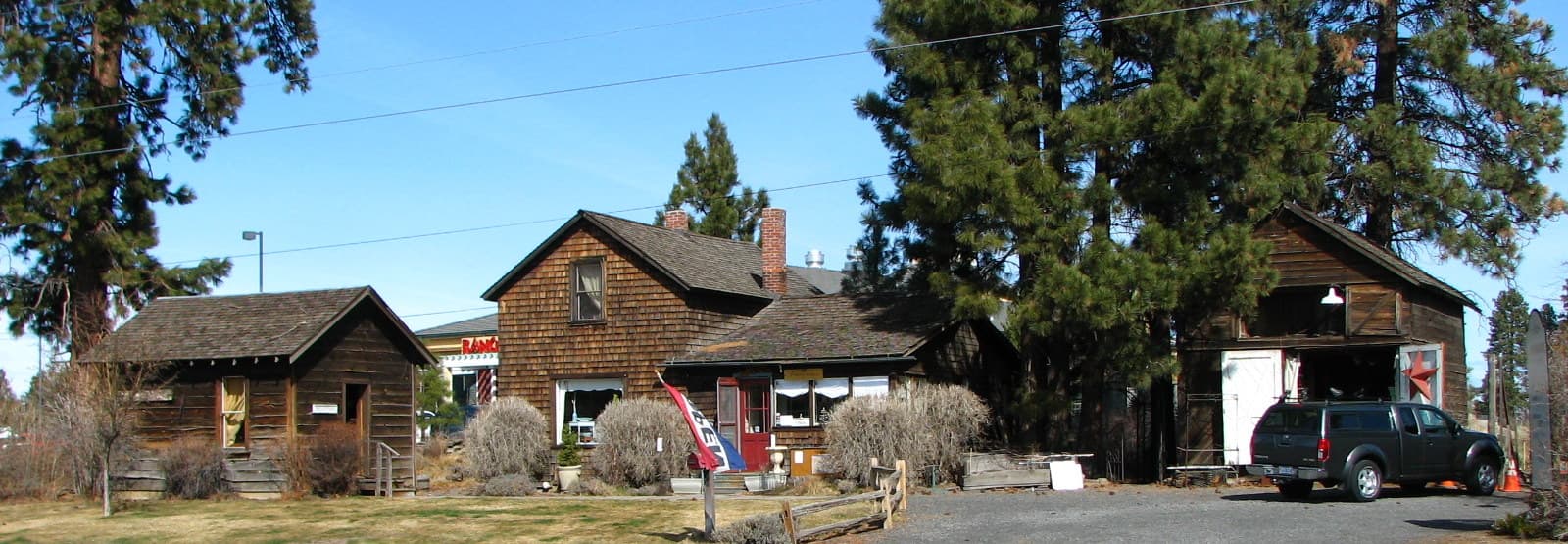 Residential homes in Bend, Oregon with the Cascade mountains and high desert landscape in the background.
