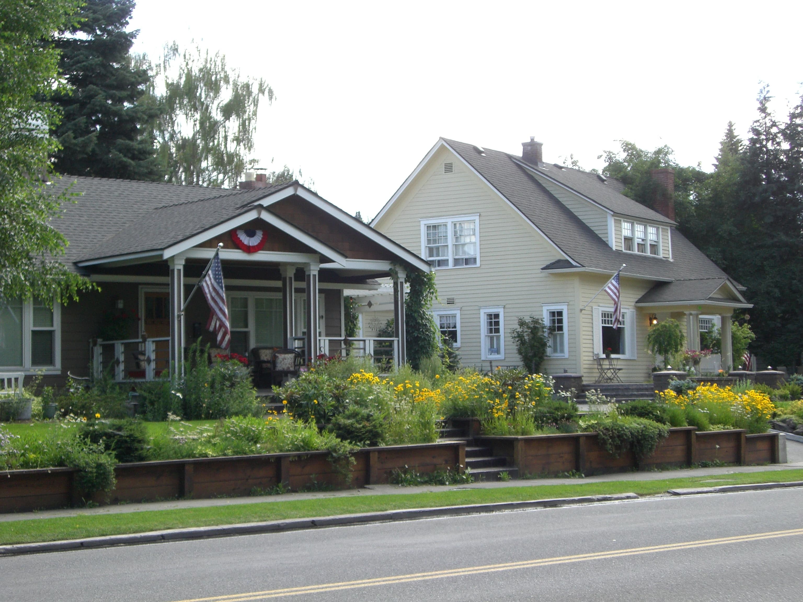 Residential homes in Bend, Oregon with the Cascade mountains visible in the background.